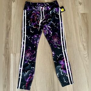NWT Avia Women’s purple floral capri running/ workout pants.